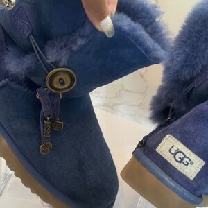Blue woman’s Ugg boots size 8 with hanging charm
